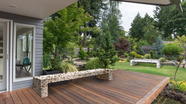 Een betonnen tuinbank maakt jouw tuin exclusief